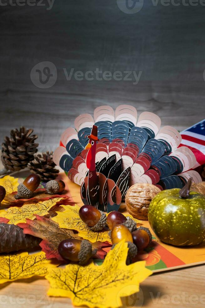 Thanksgiving pumpkins with fruits and falling leaves. photo