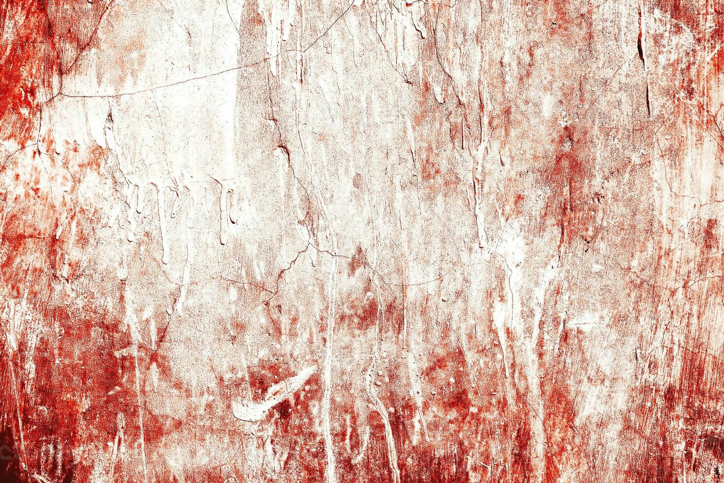 Dark red blood on old wall for halloween concept photo