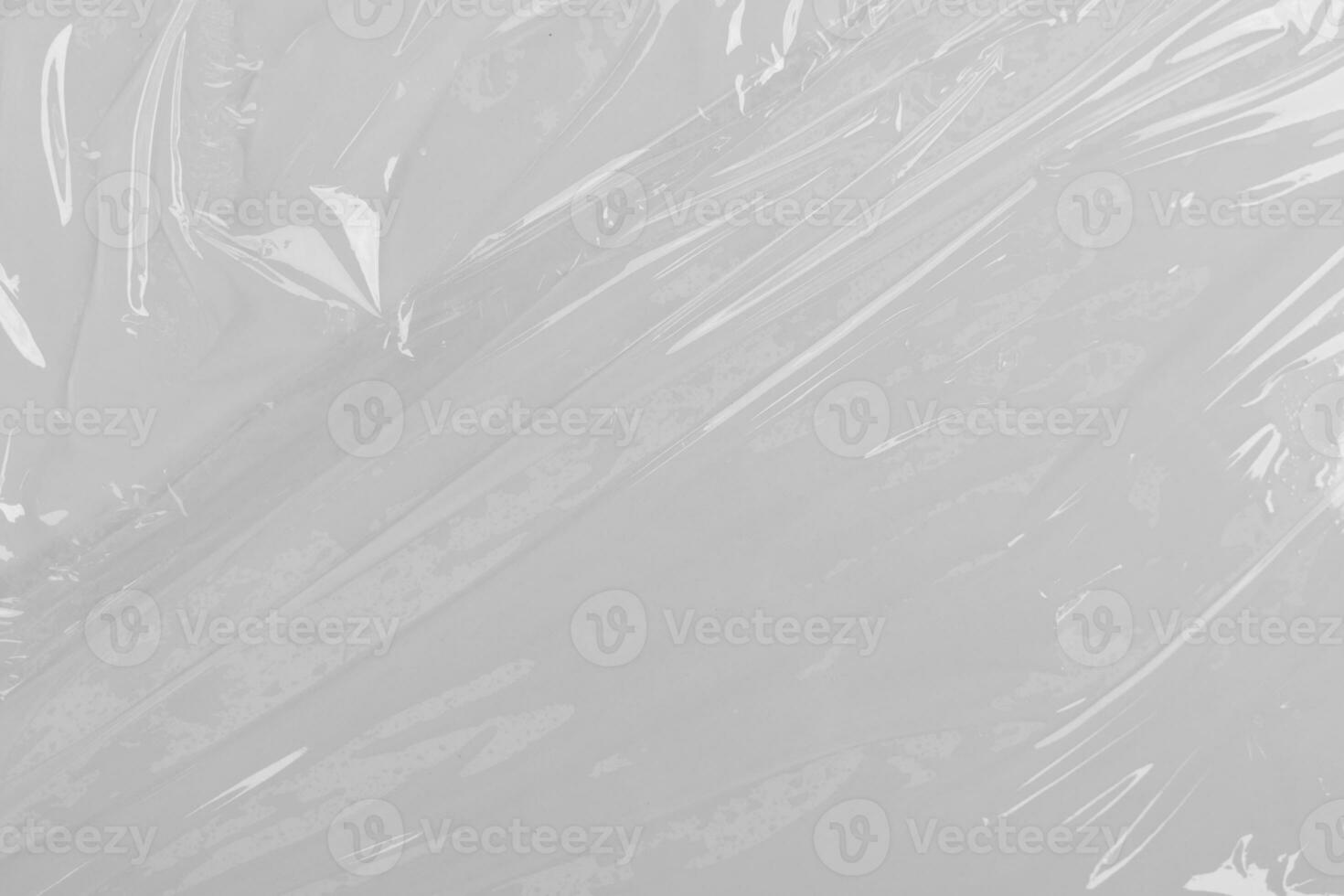 White plastic or polyethylene bag texture, Transparant wrinkled plastic, macro, white background photo