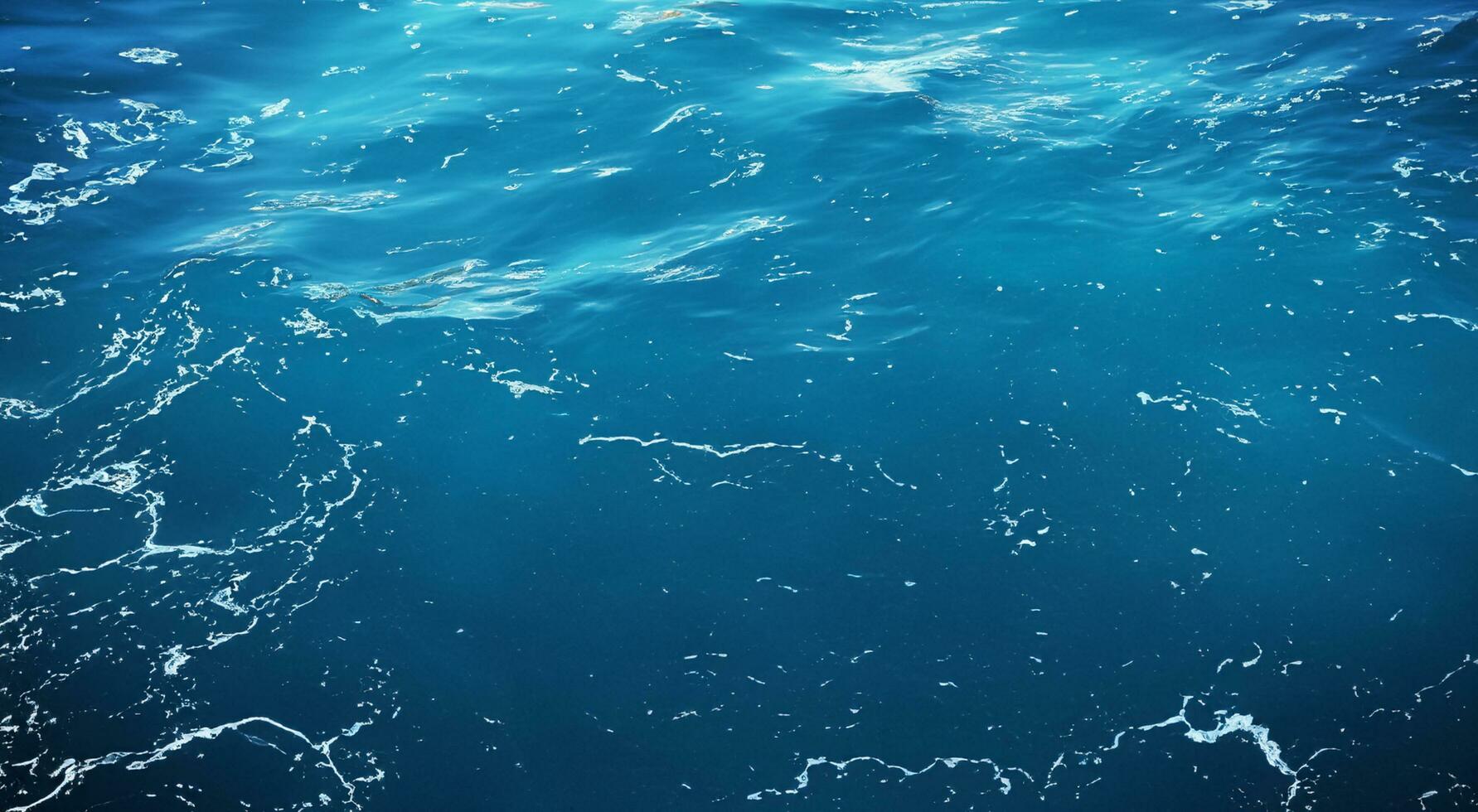 Blue water surface background photo