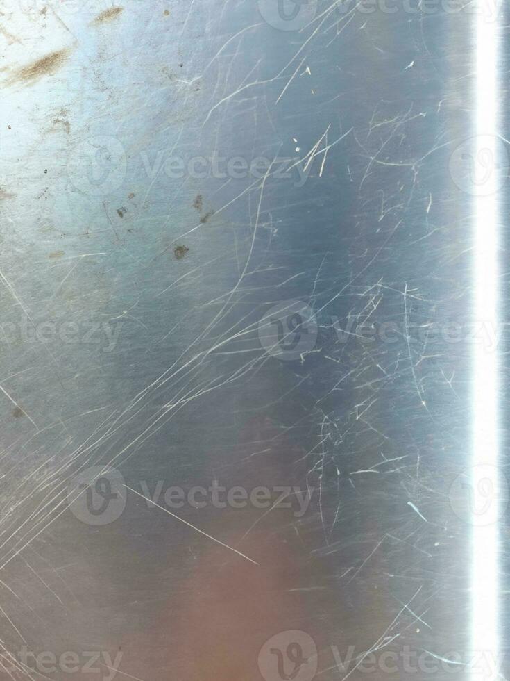 Metal texture with dust scratches and cracks. photo