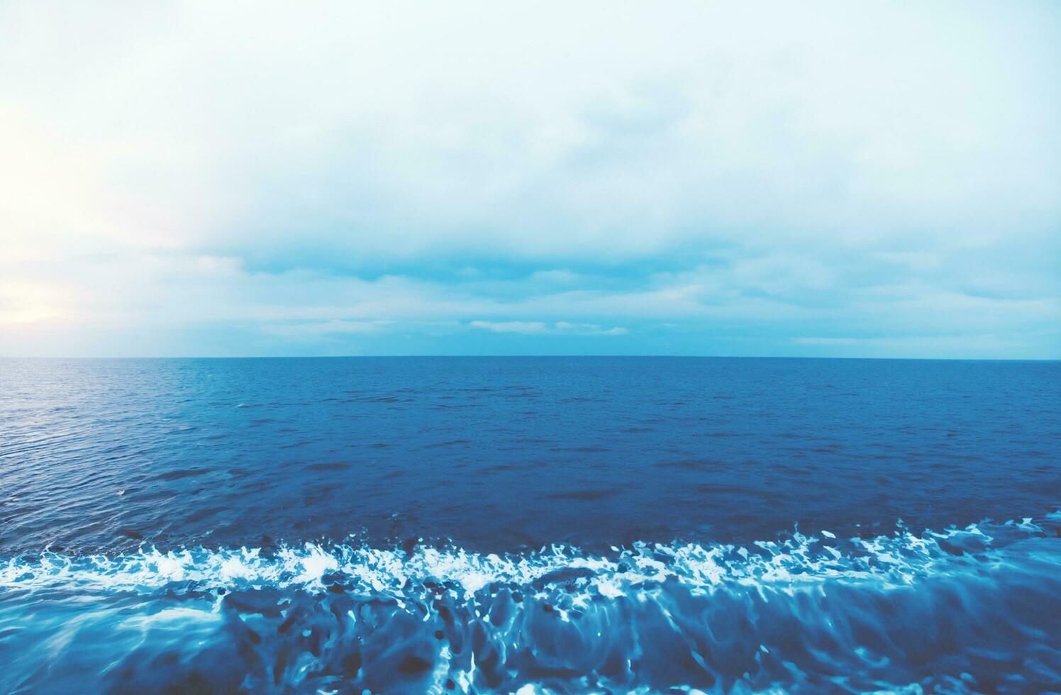 Blue water surface background photo