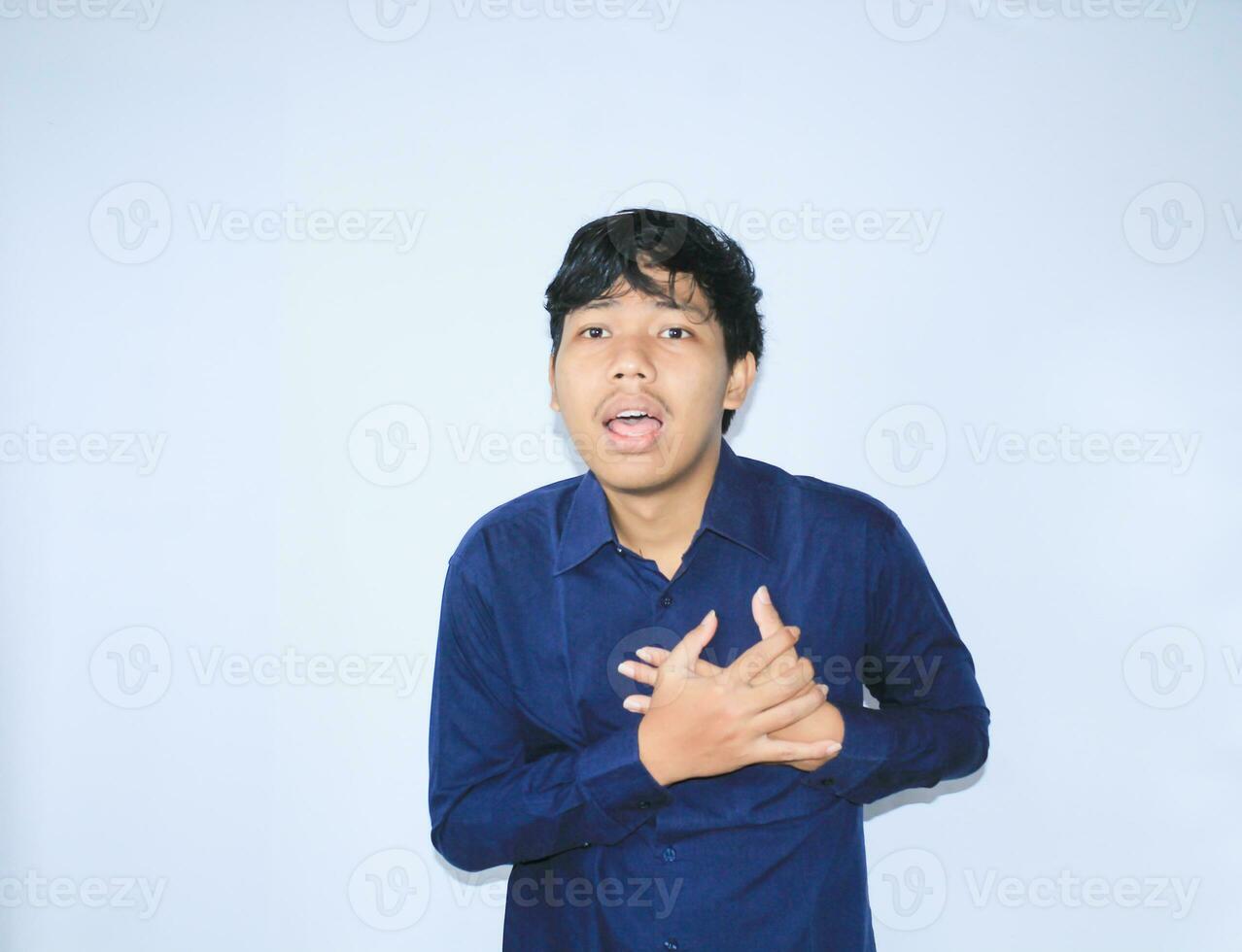 heart attack, asian office worker holding his chest suffering from heart pain caused stressful job. isolated white photo