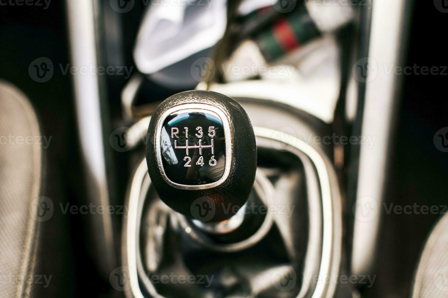 Close up of a car gear stick manual transmission, Manual gear lever of a car. Image of a car gear stick manual transmission. photo