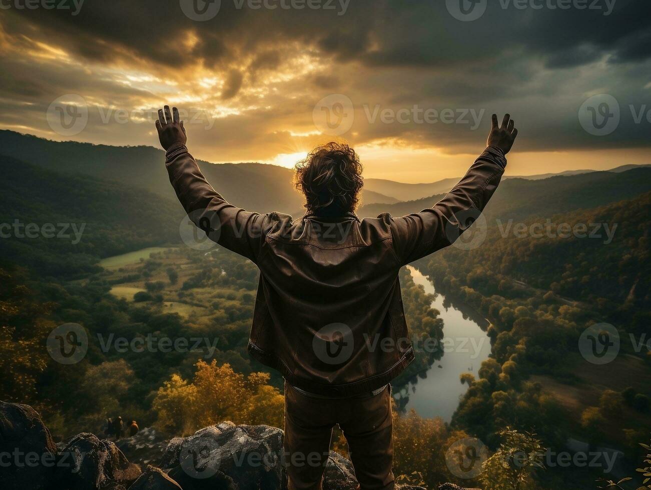 An adventurer standing on a cliff edge, looking out at a vast expanse of wilderness generative ai photo
