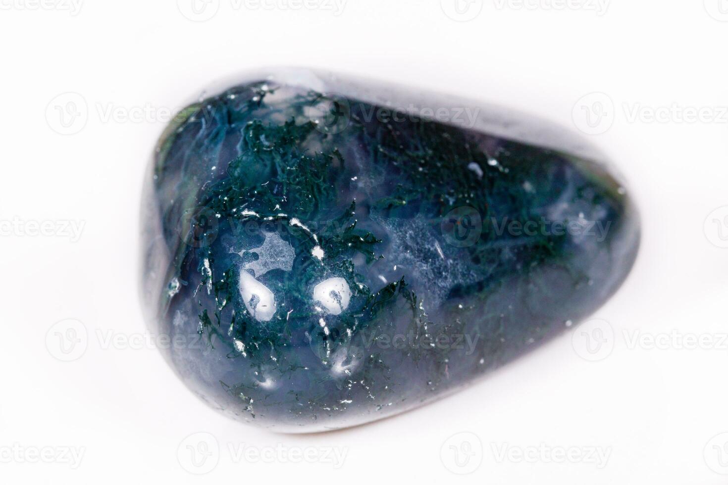 Macro mineral stone Agate mossy India on a white background photo
