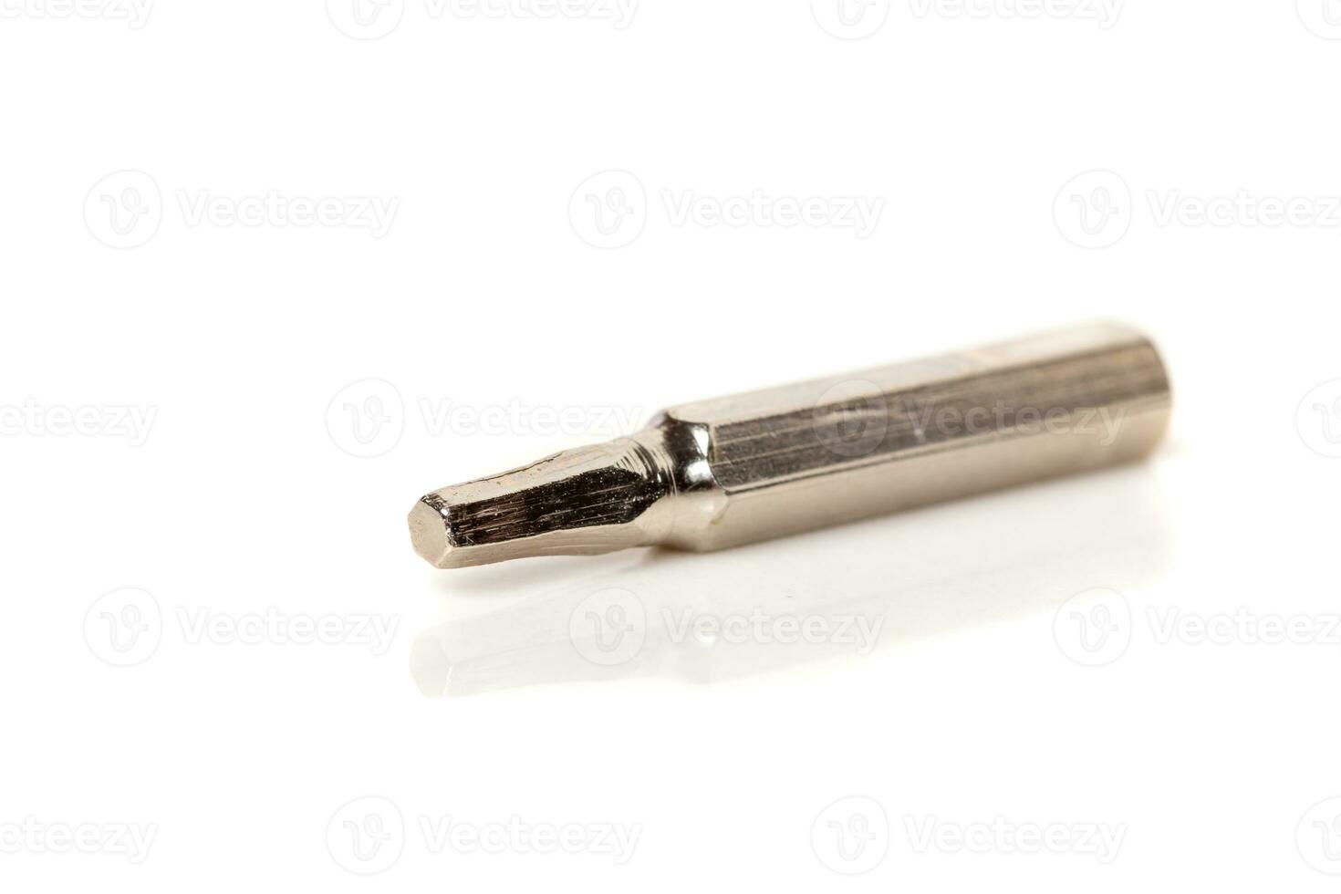 A set of different attachments for a head screwdriver with a screwdriver on a white background photo