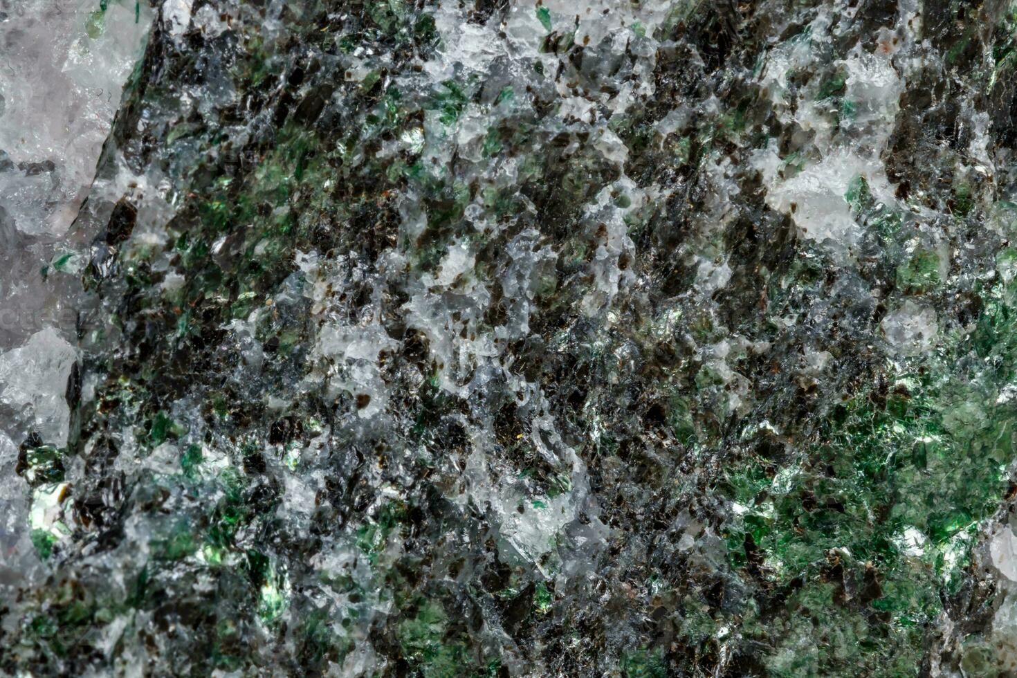 Macro mineral stone Fuchsite on a white background photo