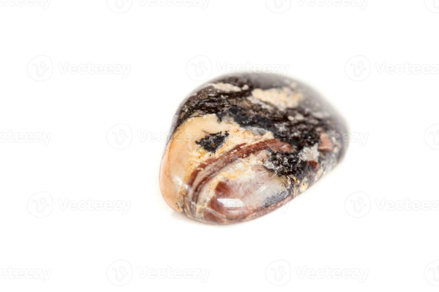 Macro mineral stone jasper on a white background photo