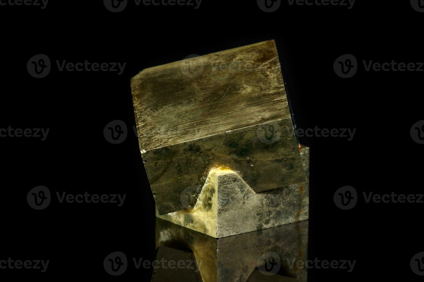 Macro mineral stone Pyrite on a black background photo