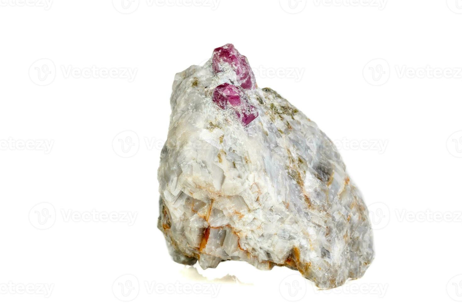 Macro mineral stone Ruby in rock on white background photo