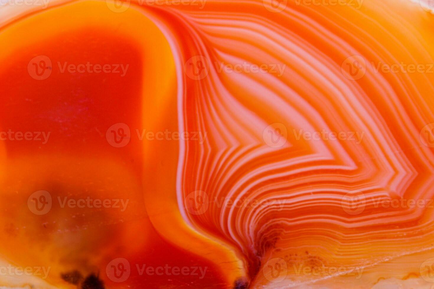 Macro mineral orange agate in crystals on white background photo