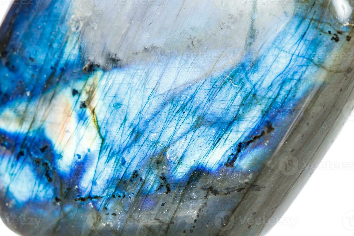 Macro mineral stone Labradorite on white background photo