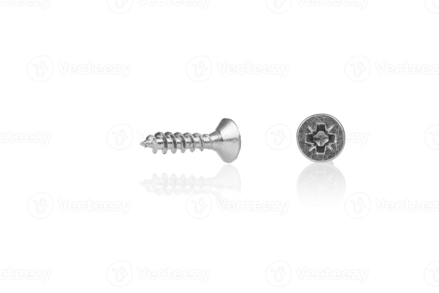 macro screw of silver color on a white background photo