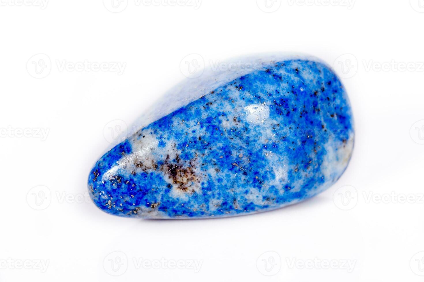 Macro mineral stone blue lapis lazuli afghanistan on white background photo