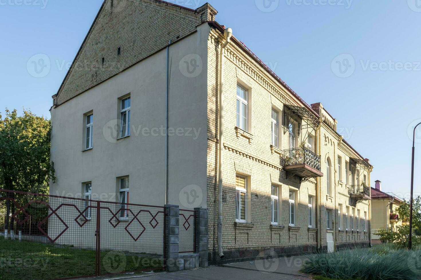 example of hundred-year-old historical building and homestead of private sector in city photo