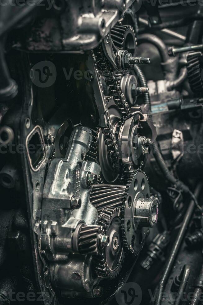 Car timing chain in cutaway engine photo