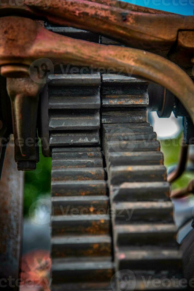 Old rusty gears on abandon steam machine photo