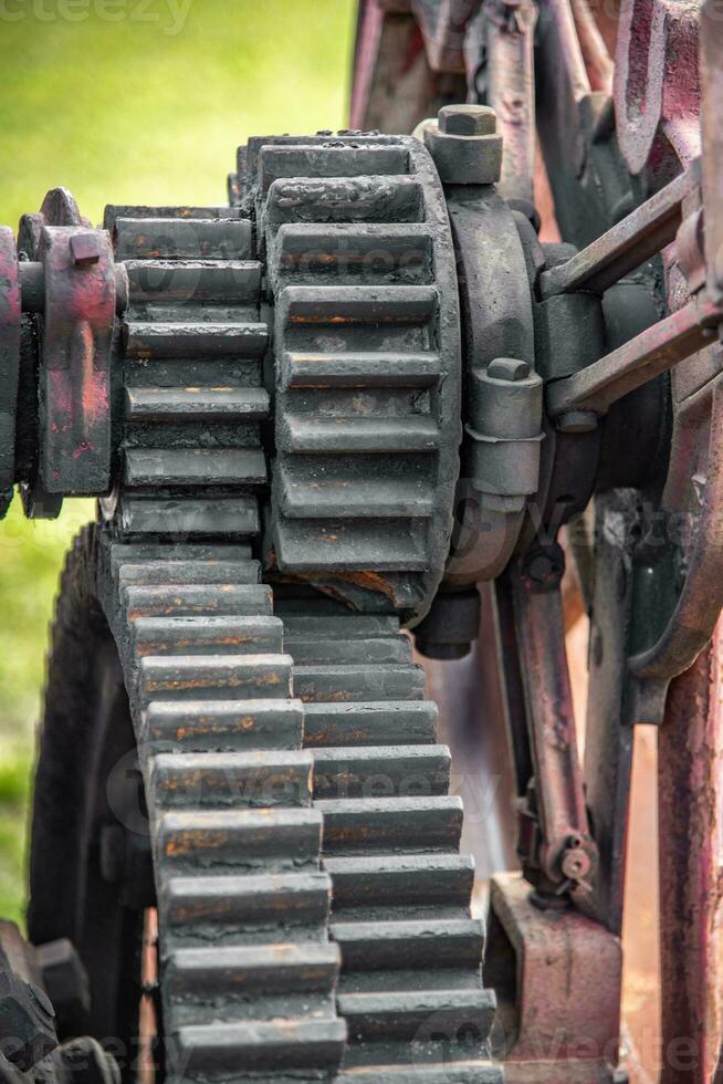 Old rusty gears on abandon steam machine photo