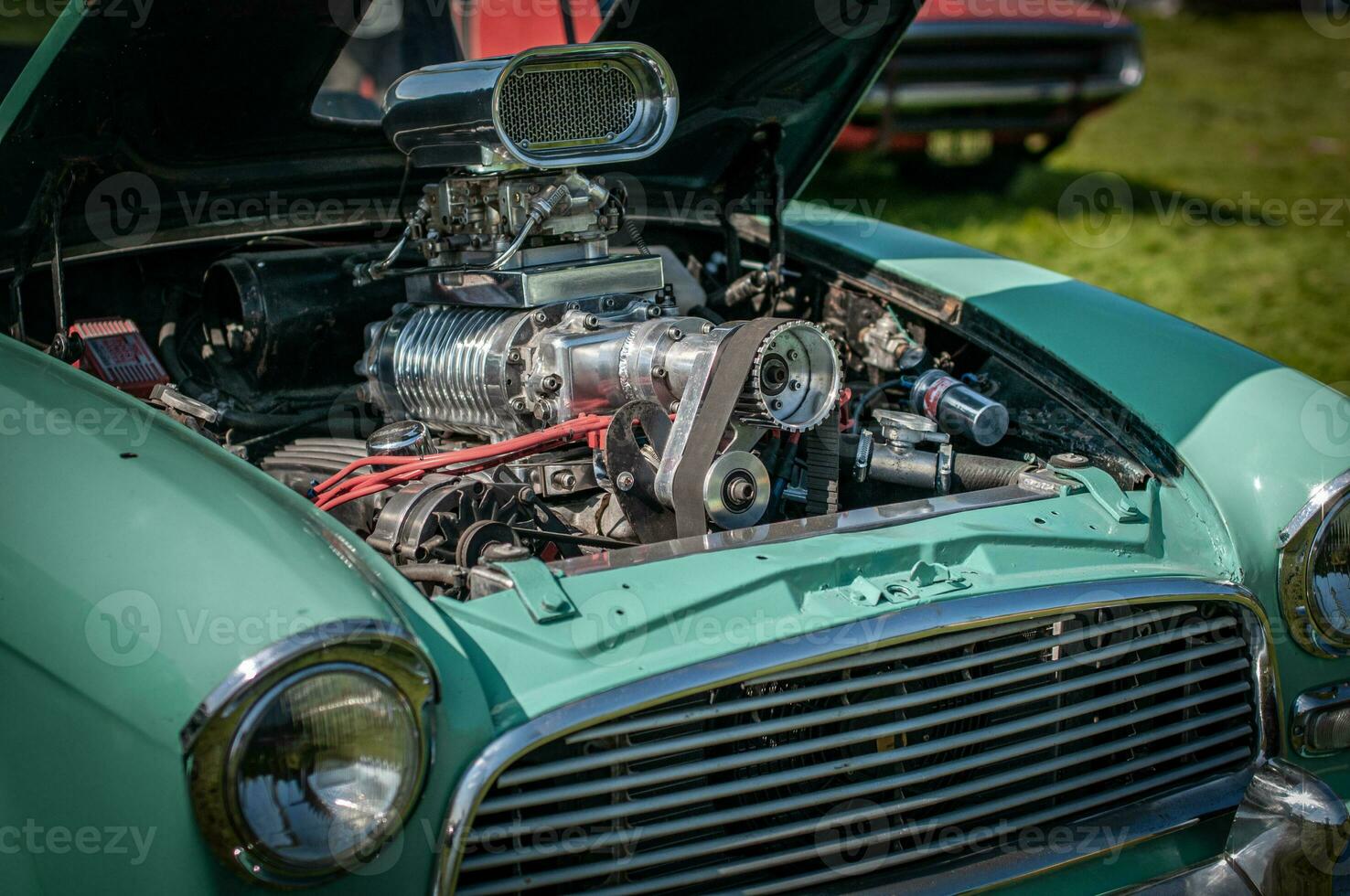 Big supercharged V8 in a classic, vintage drag car photo