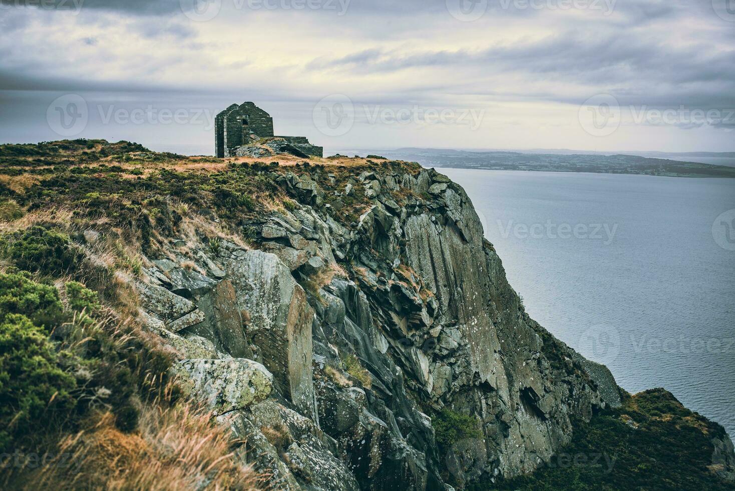 Old abandon structure on top of the mountain by the quarry, moody weather, Llanfairfechan, North Wales, Cymru, UK photo