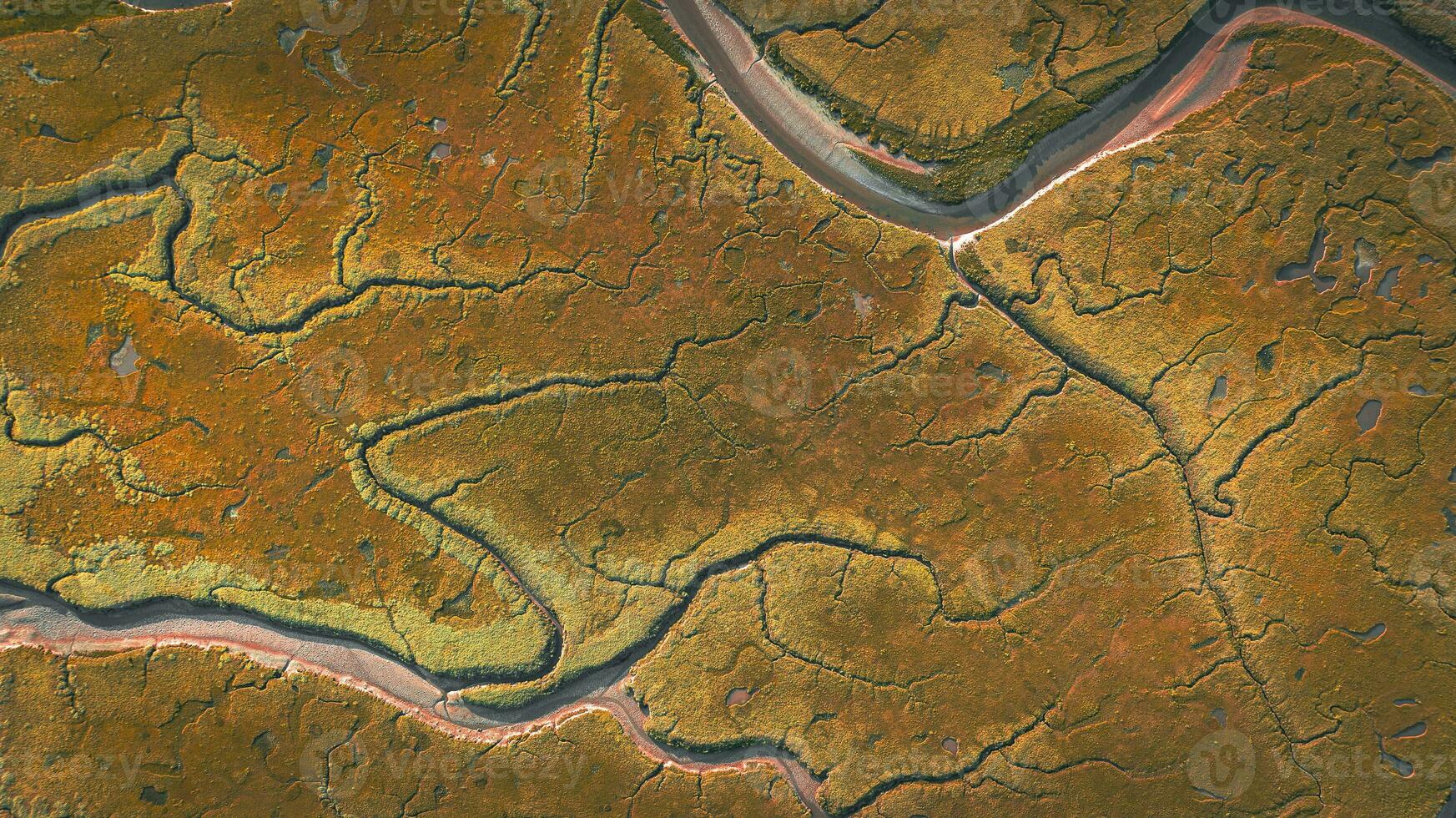 Aerial view of low tide with visible river bed by the beach Llanfairfechan, North Wales, Cymru, UK photo