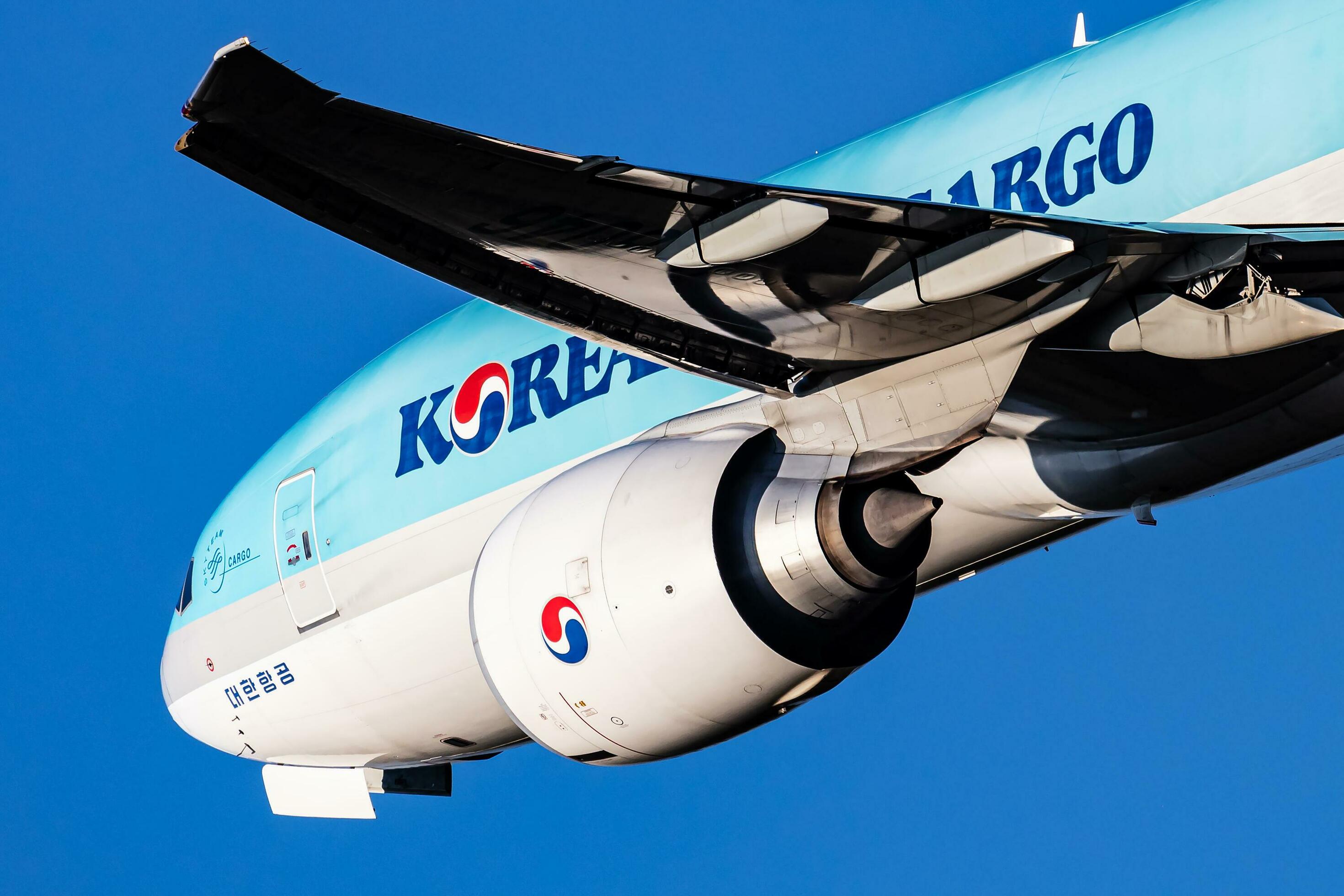 Korean Air Cargo Boeing 777200 cargo plane at airport. Air freight and