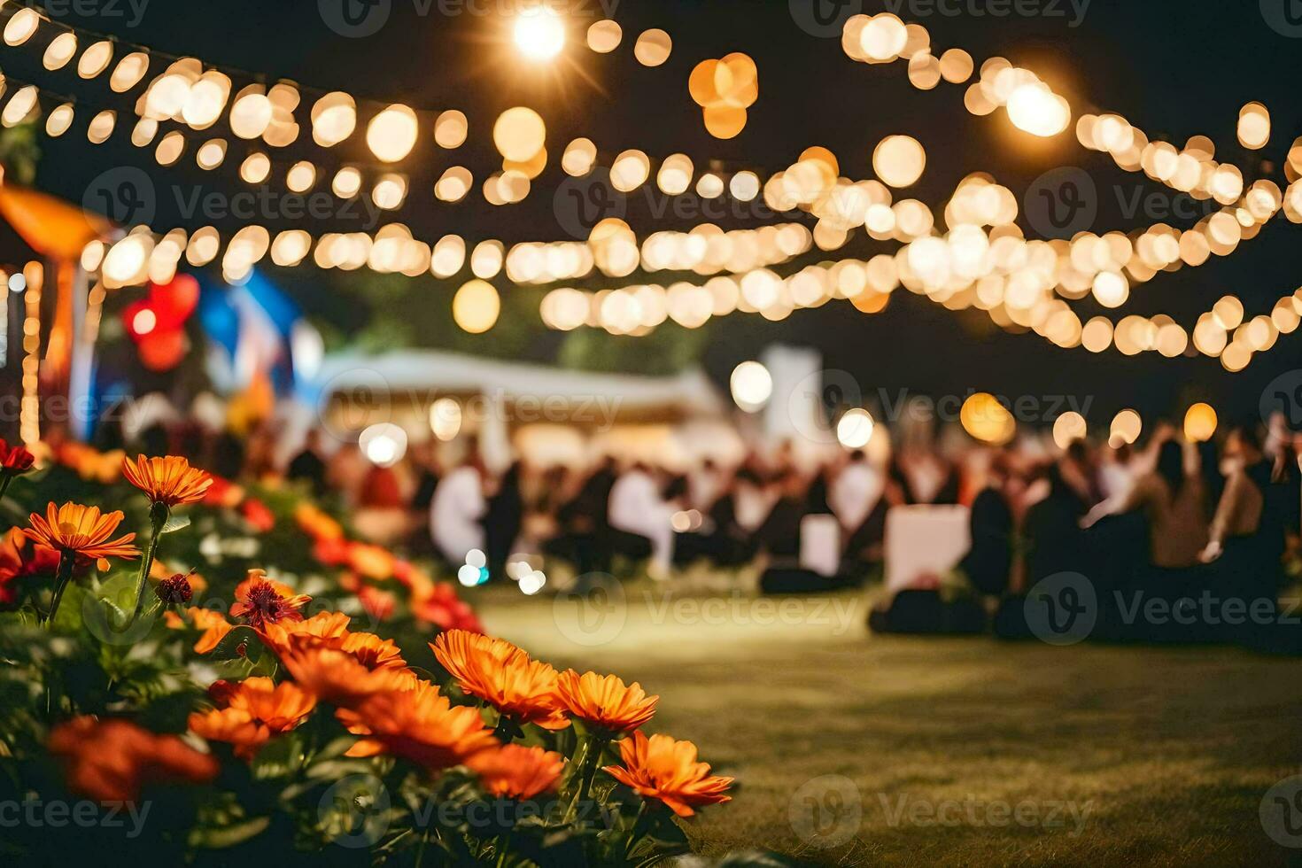 un jardín con luces y flores a noche. generado por ai foto