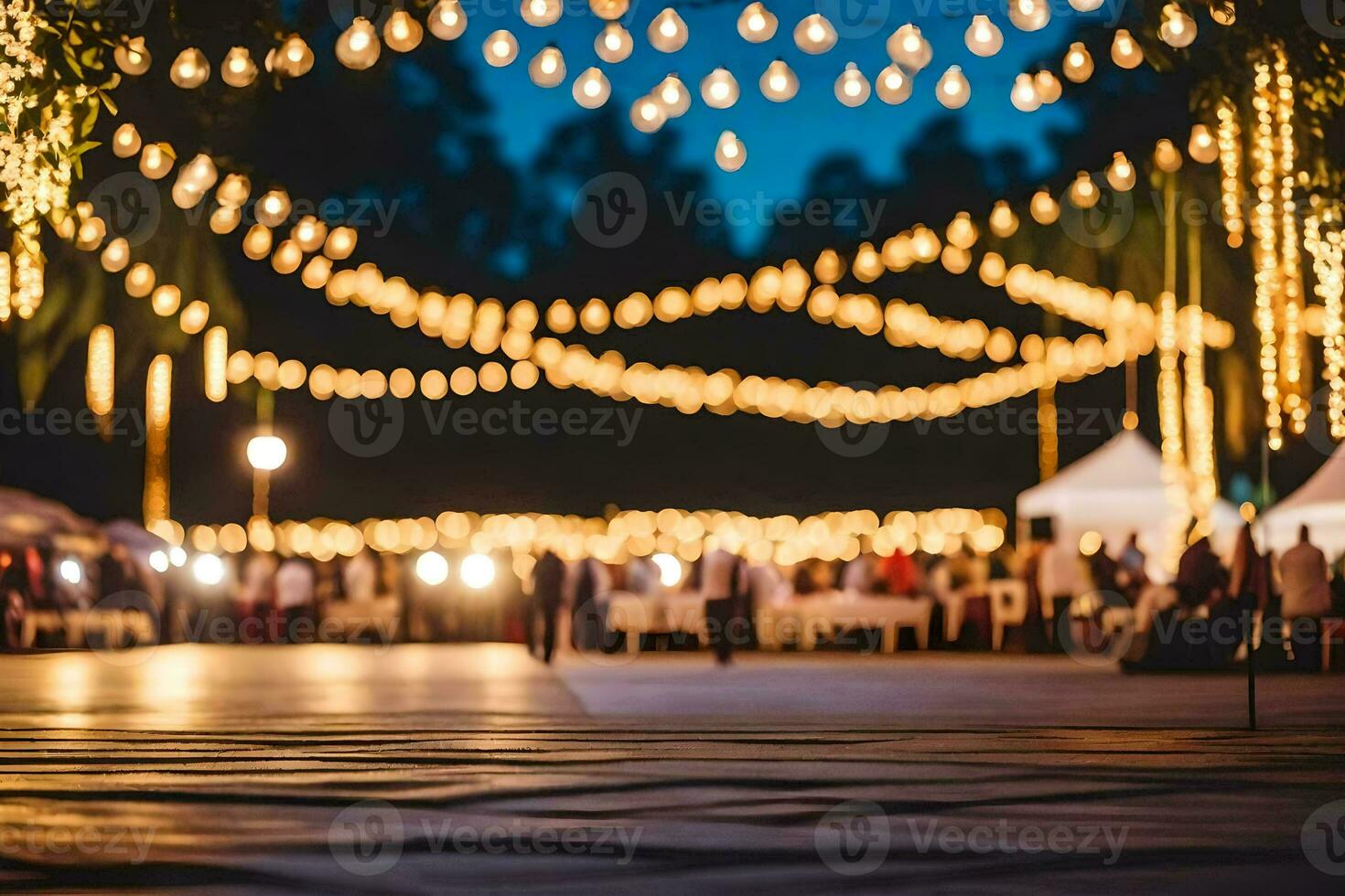 a wedding reception with lights strung across the ground. AI-Generated photo