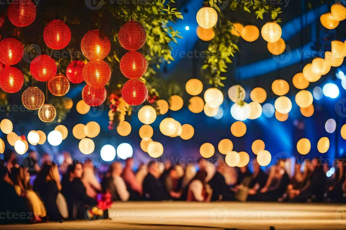 a group of people sitting under a tree with red lanterns. AI-Generated photo