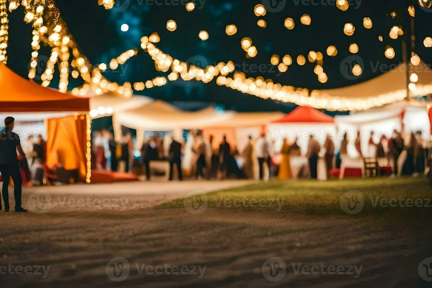 people walking through a field at night with lights. AI-Generated photo