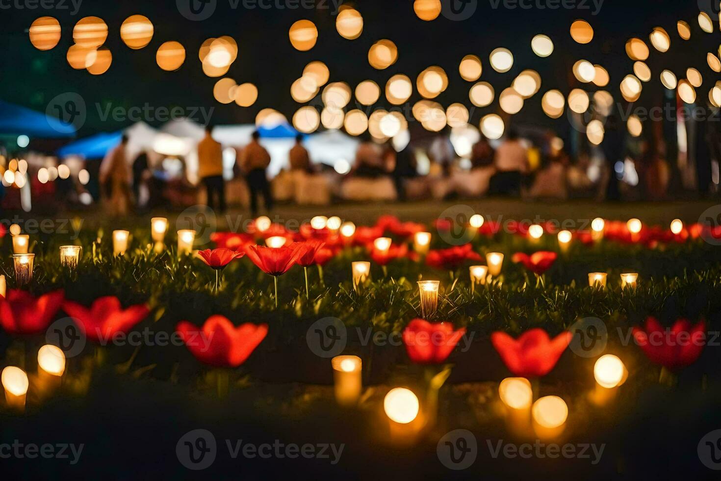 red tulips and candles in the grass at night. AI-Generated photo