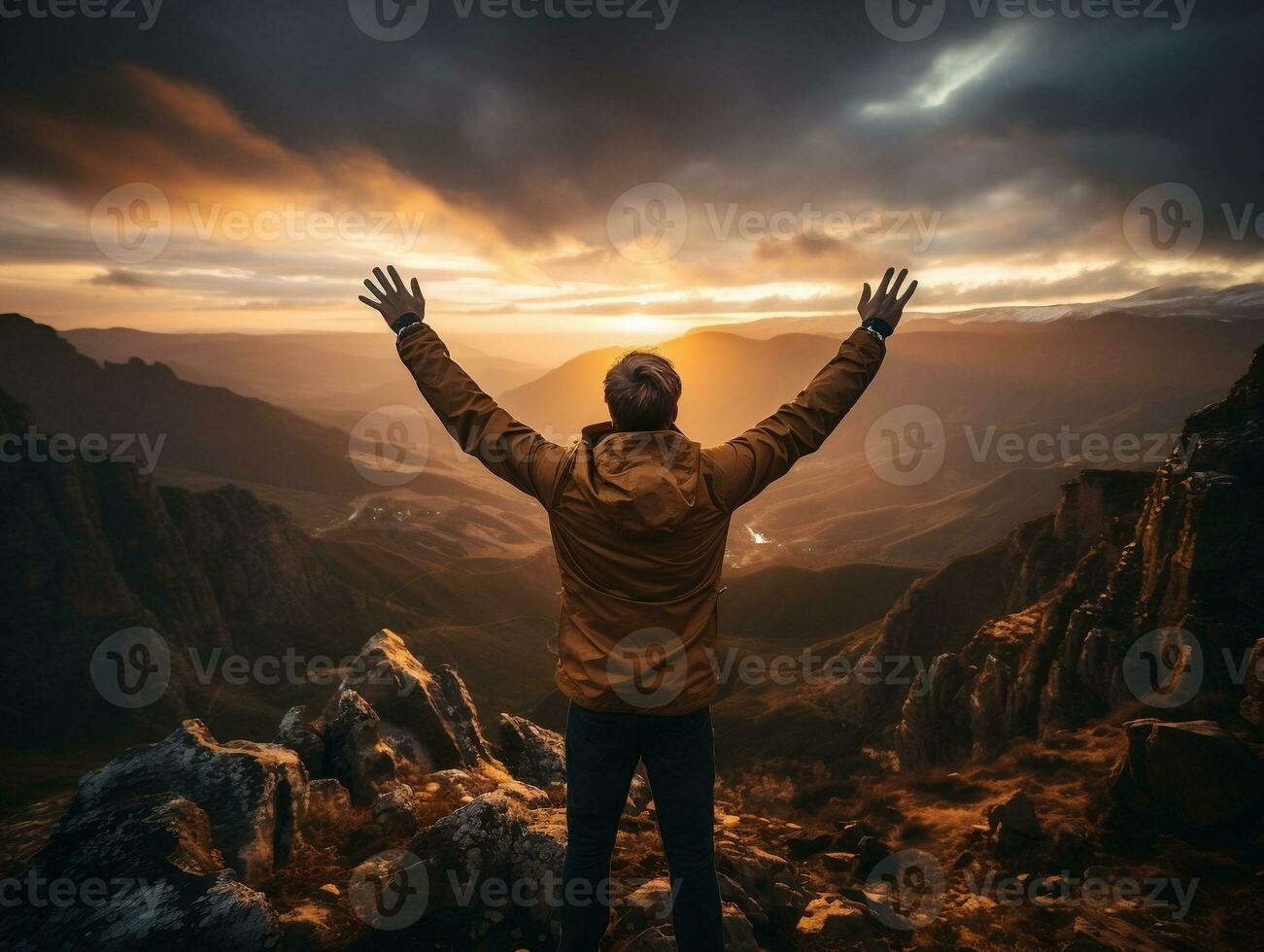 A hiker standing on a mountain peak, with a breathtaking sunset sky as the backdrop generative ai photo