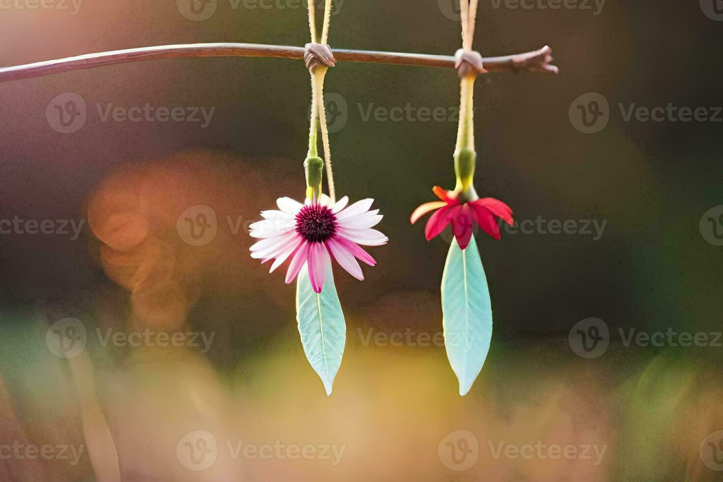 two flowers hanging from a branch. AI-Generated photo