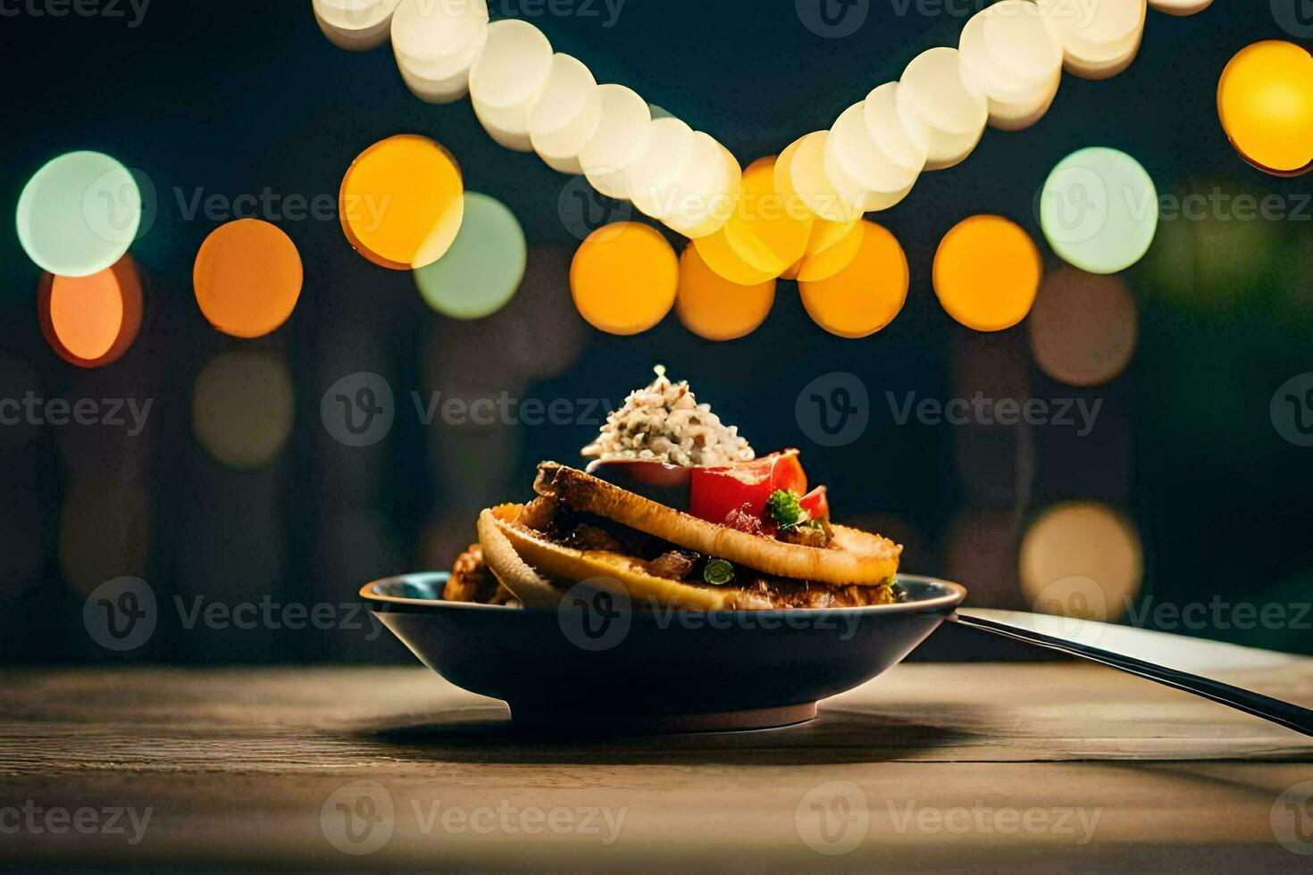 a bowl of food with a fork and knife on a table. AI-Generated photo