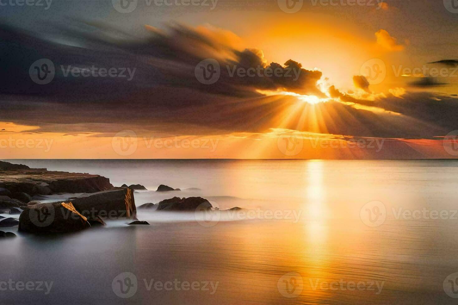 puesta de sol terminado el Oceano con rocas y nubes generado por ai foto