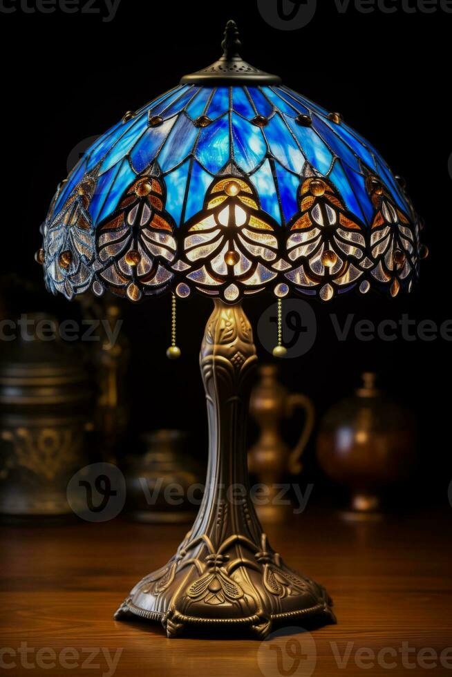 Tiffany style table lamp on an oak table background with empty space for text photo