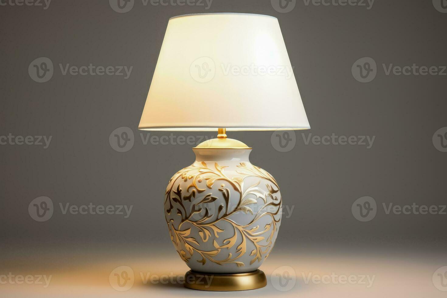 Classic porcelain table lamp spreading soothing light isolated on a gradient background photo