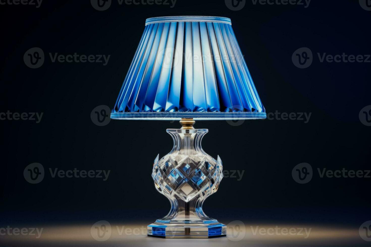 Elegant crystal table lamp emitting soft illumination isolated on a gradient background photo