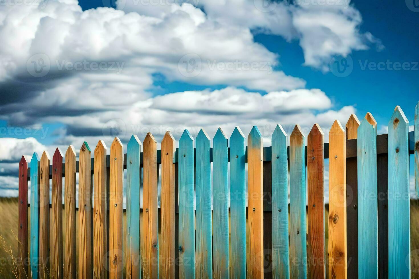 a colorful fence against a blue sky. AI-Generated photo