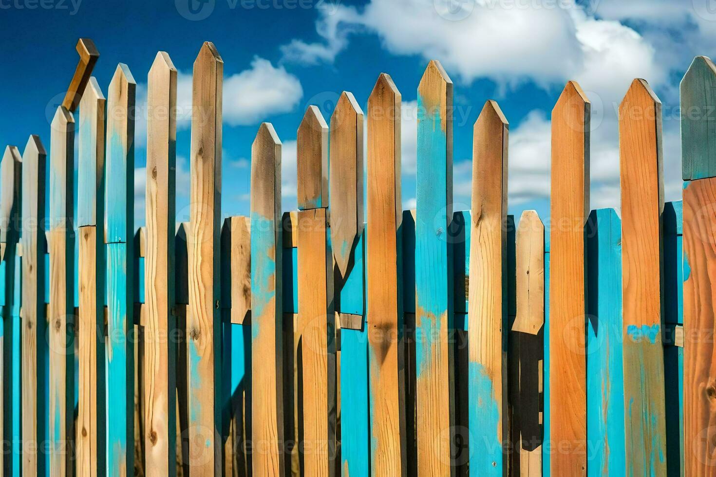 a wooden fence with blue paint on it. AI-Generated photo
