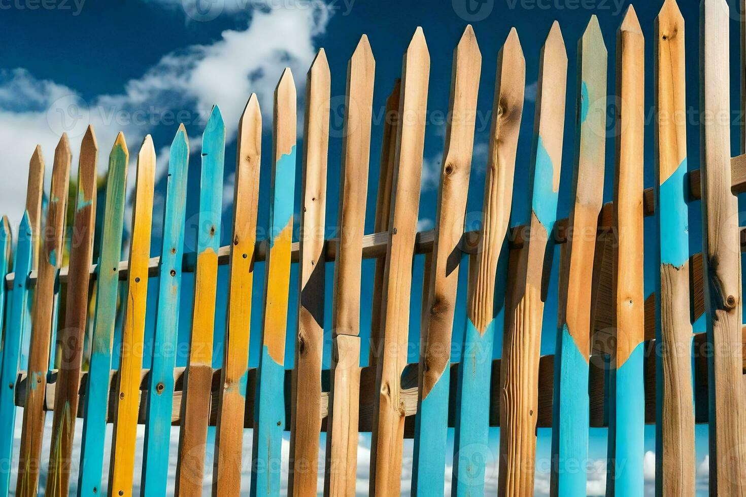 a wooden fence with colorful painted sticks. AI-Generated photo