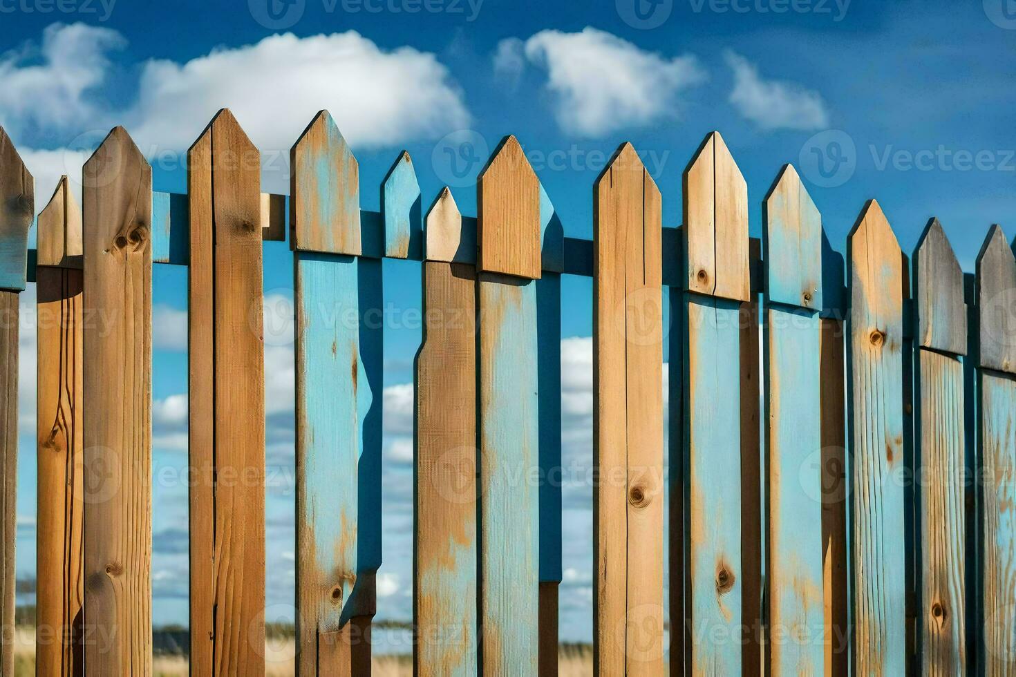a wooden fence with blue sky and clouds in the background. AI-Generated photo