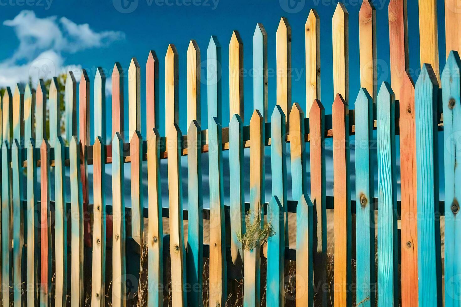 a colorful fence with a blue sky in the background. AI-Generated photo