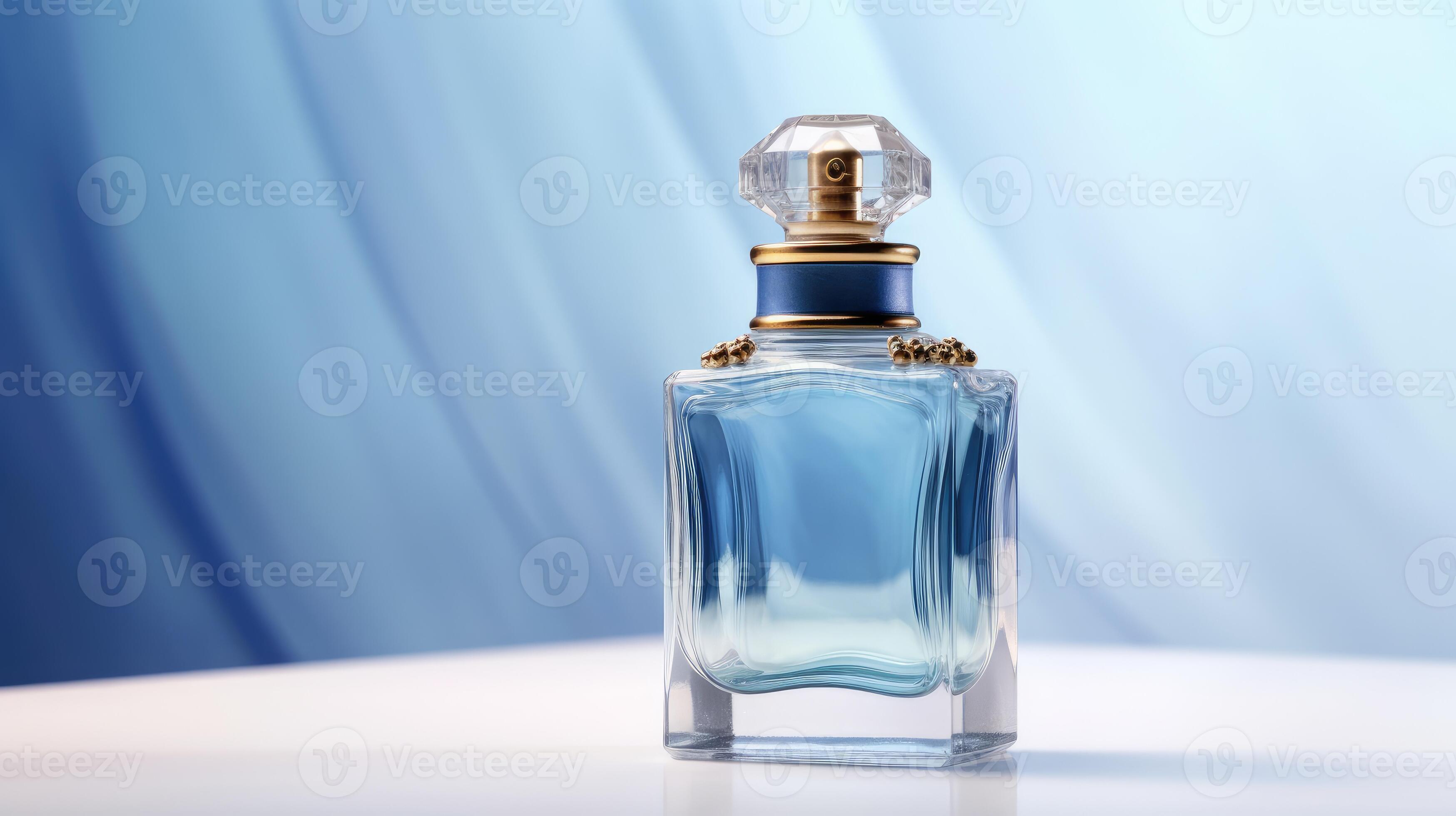Perfume bottle on blue background 30903703 Stock Photo at Vecteezy