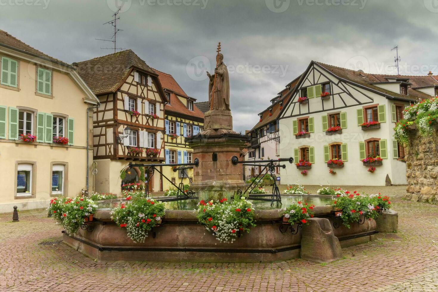 Saint-Leon fountain in Eguisheim, Alsace, France photo