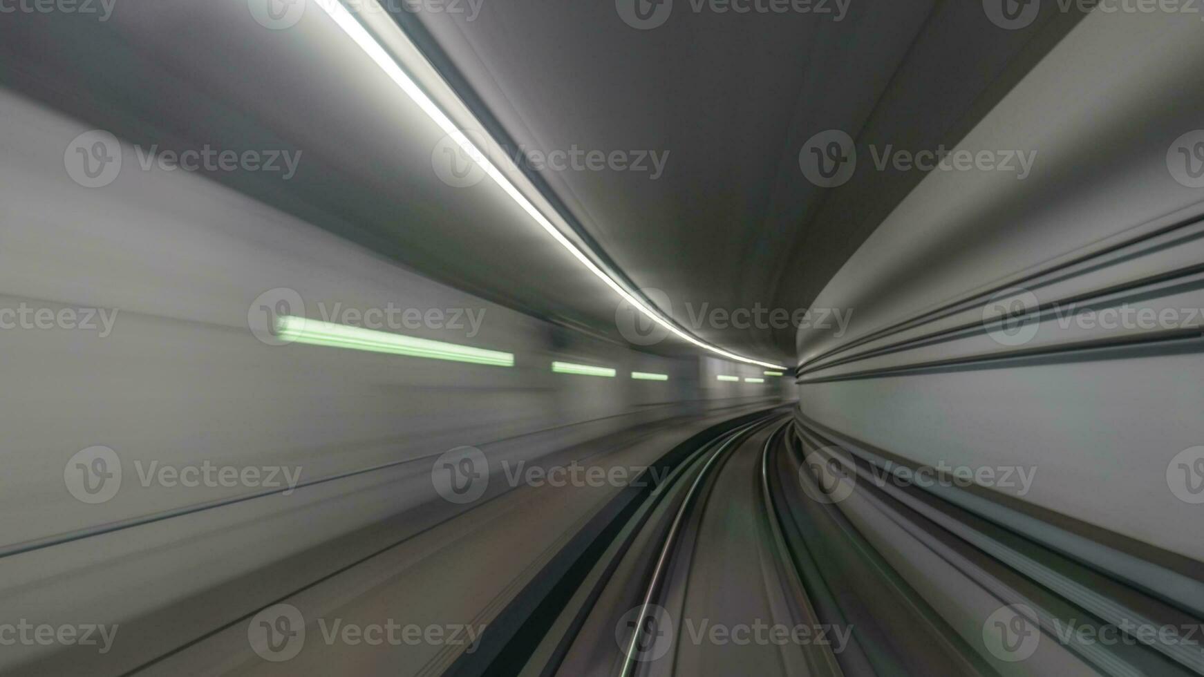 Subway rails in tunnel photo