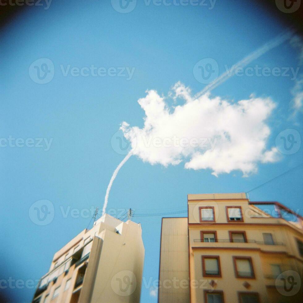 Residential buildings against the blue sky photo