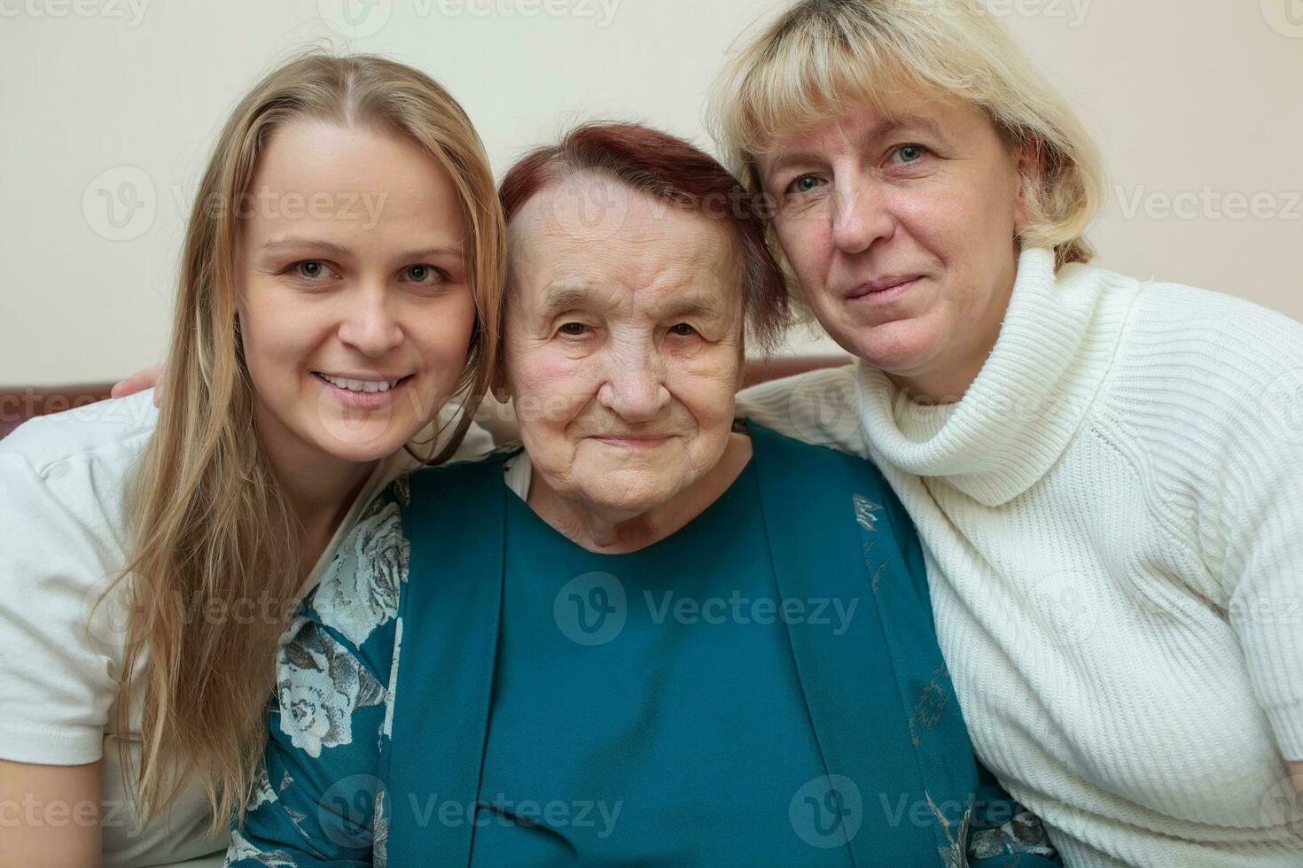 Family portrait with mother, daughter and grandmother photo