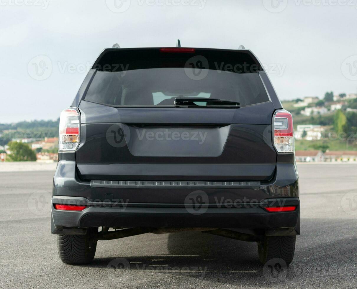 Grey SUV rear view photo